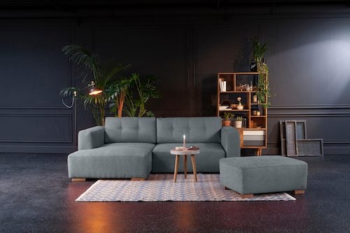 Modernes Ecksofa in grau mit Hocker